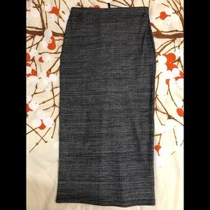 Sexy pencil skirt, with high slit in the back.